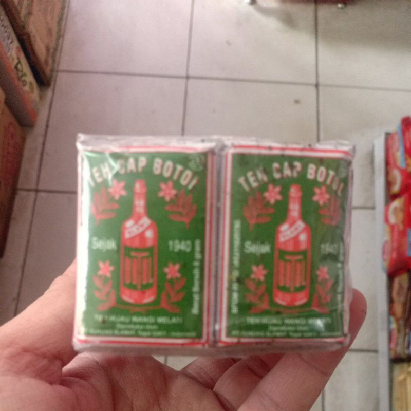 

1 PAK TEH CAP BOTOL HIJAU KECIL 4 GR [ 10 PC ]