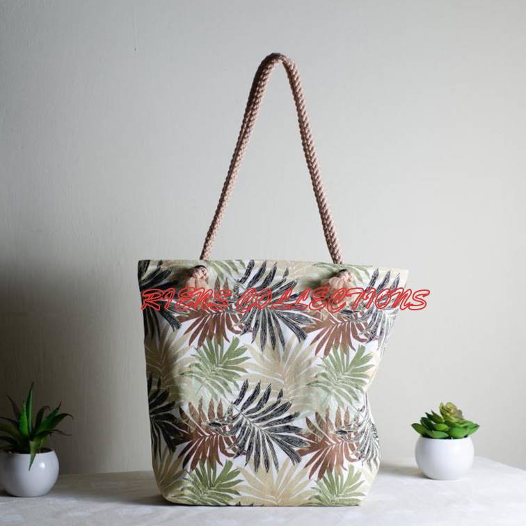 RIENS COLLECTIONS. TOTEBAG TALI SUMBU / KEPANG KANVAS MOTIF FLORAL PALM COKLAT. TAS KANVAS. TAS JOGJA. SOUVENIR JOGJA