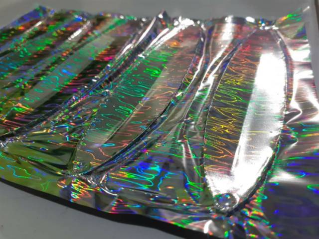 HOT STAMPING FOIL / HOLOGRAM FOIL / HOLOGRAPHIC FOIL IMPORT MOTIF MINYAK GRADE A ORI