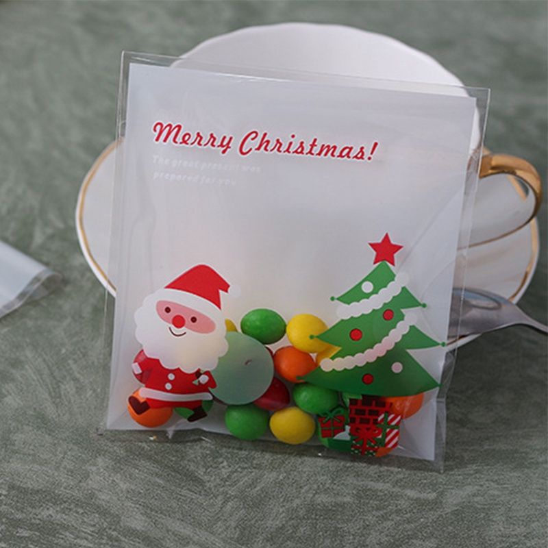 

(20pcs) kantong plastik Motif Santa Claus Natal christmas tree/ cookies bag candy hampers