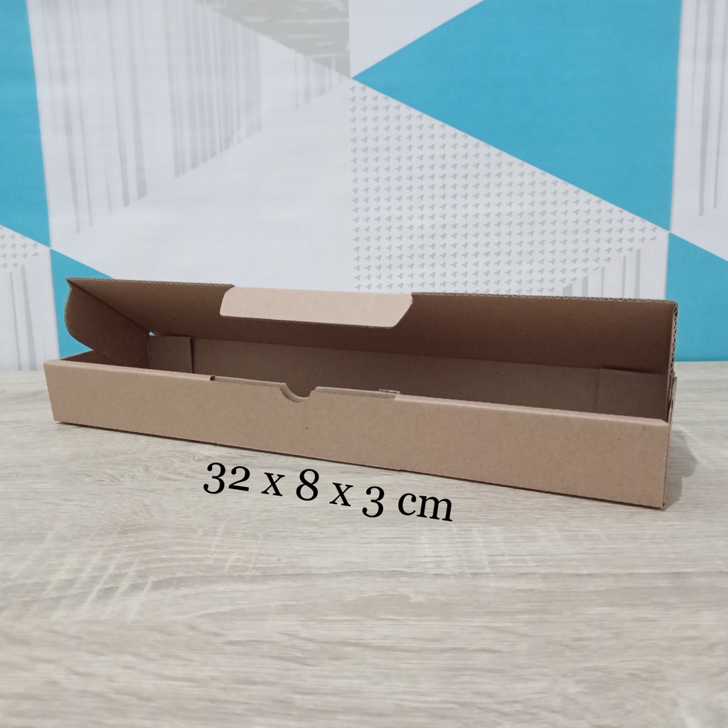 

Kardus 32 x 8 x 3 cm....Die Cut kotak aksesoris dll