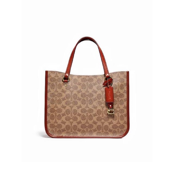 COACH TYLER CARRYAL 28 IN SIGNATURE CANVAS