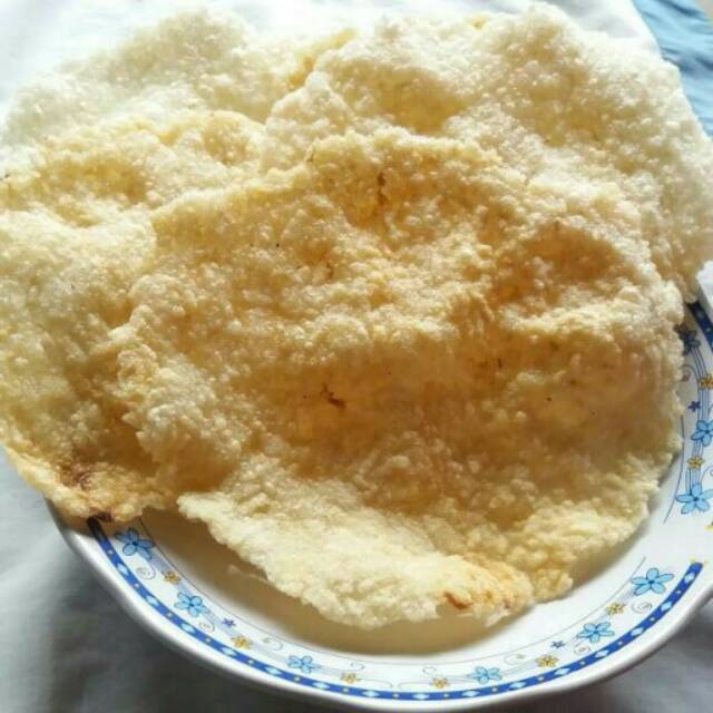 

Krupuk beras/ krupuk puli/ camilan lezat/ camilan sehat/ opak beras/ makanan khas blitar/ no msg