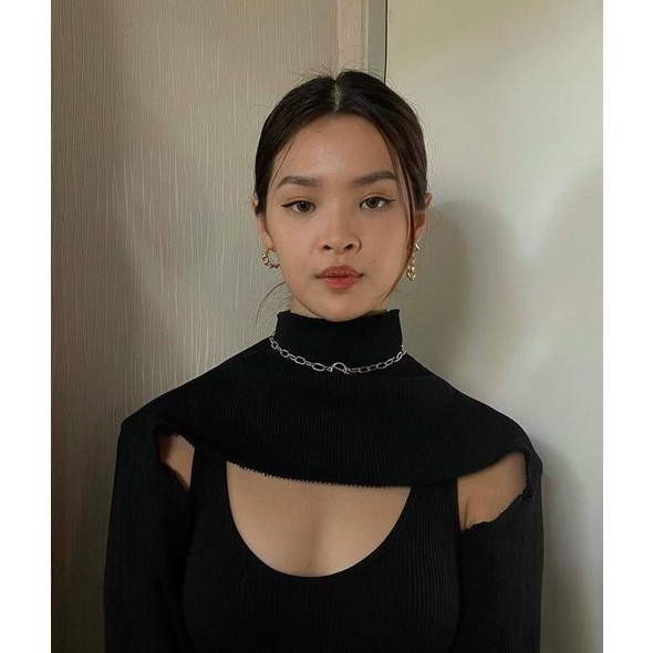 Calderon ripped sweater