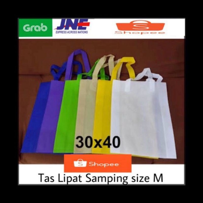 

TAS KAIN SPUNBOND HLS L 30x40 GOODIE BAG SHOPPING BAG FURING TAS KAIN 1 LUSIN ISI 12 PCS