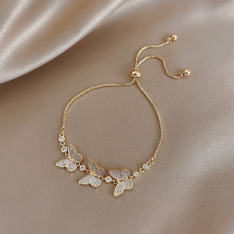 Gelang Tangan Desain Kupu-Kupu Aksen Zircon Warna Permen Untuk Wanita