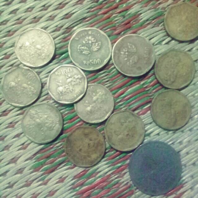 Koin 100 sama 500 rupiah