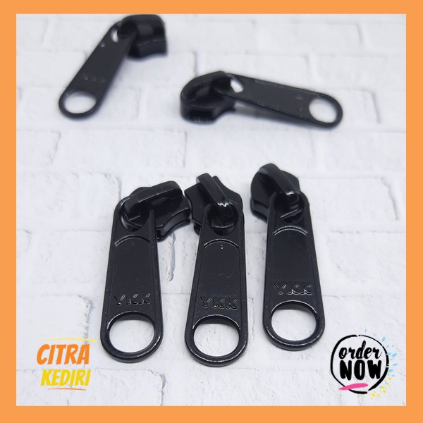 Kepala Resleting YKK lubang bulat hitam