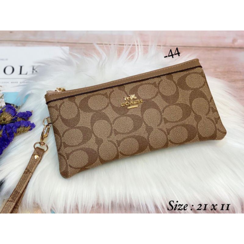 fashion branded dompet panjang,pouch hpo motif coach 2072