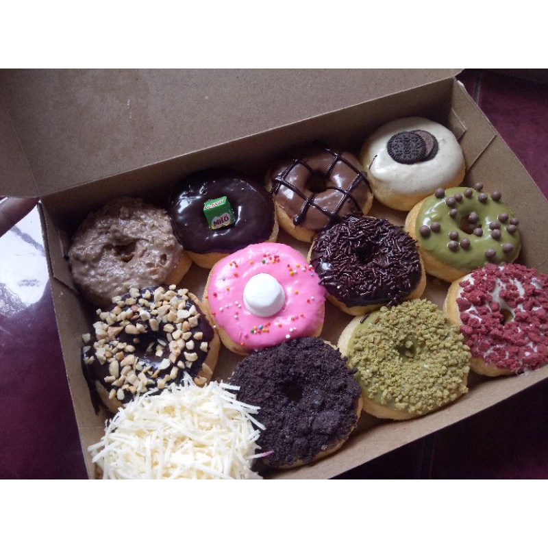 

donat sedang isi 12