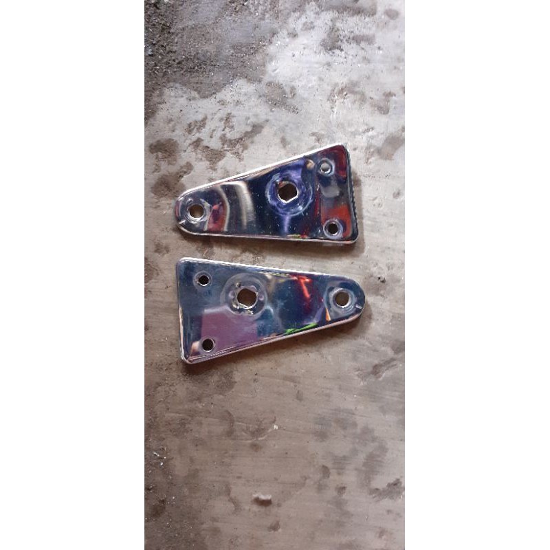 sepasang kupingan lampu depan megapro primus