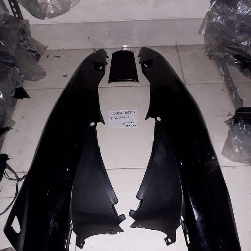 Win Cover Body dan Cover Stop Karisma X