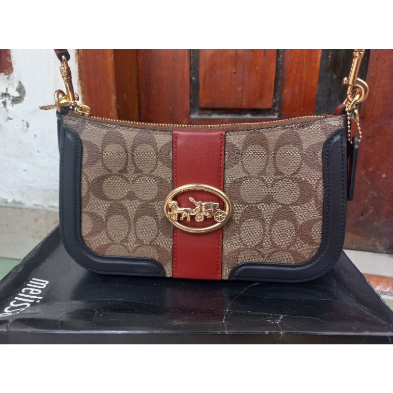 *SOLD* Coach Georgie