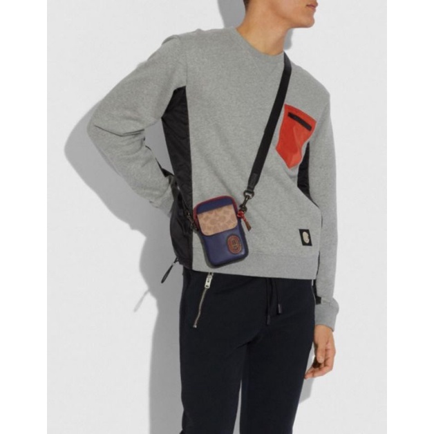 COACH PACER POUCH IN COLOURBLOCK SIGNATURE CANVAS WITH PATCH