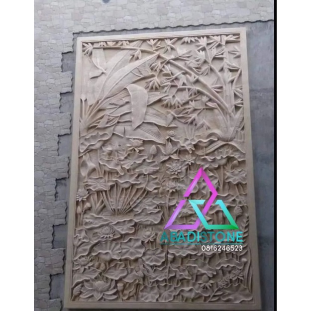 ukiran batu alam dinding relief ukir pahatan batu alam dekorasi paras jogja