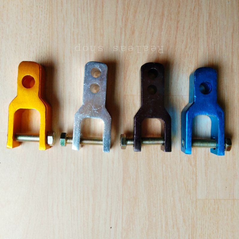 Peninggi shock belakang motor matic anting shock