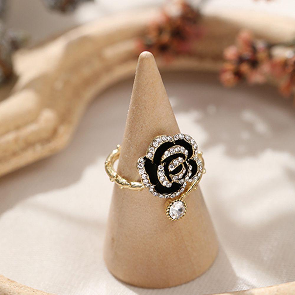 Cincin Adjustable Bahan Metal Aksen Zircon Warna Hitam Untuk Wanita