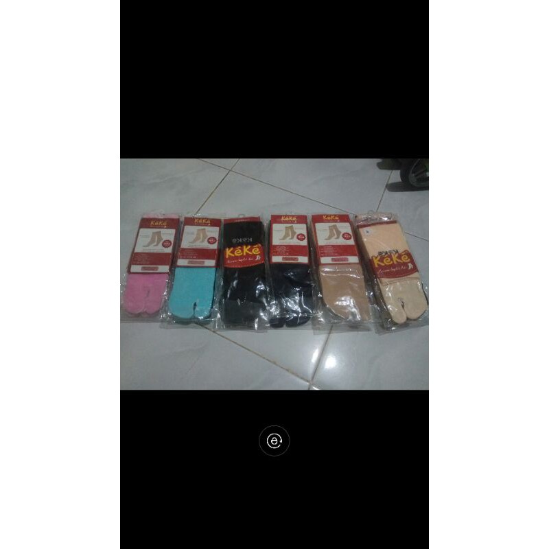 kaus kaki jempol