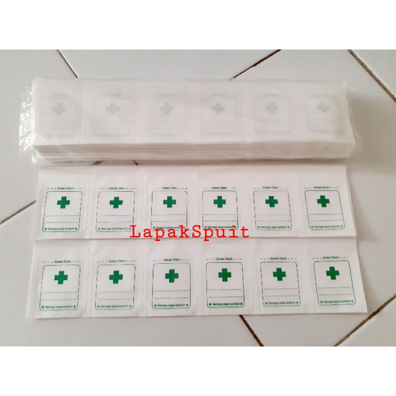 kertas puyer press / sendok puyer press / kertas puyer press logo isi 1bag 1200pcs