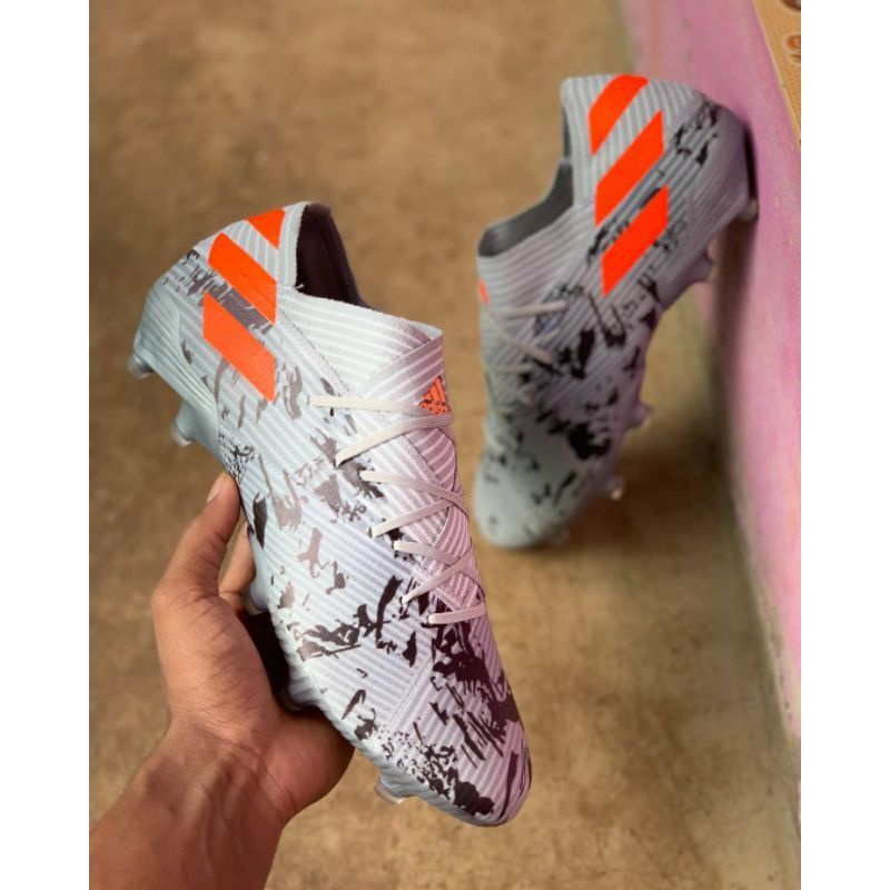 Sepatu Bola Adidas Nemeziz Grey Orange.