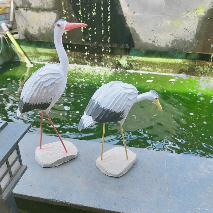 Patung bangau kecil hiasan taman