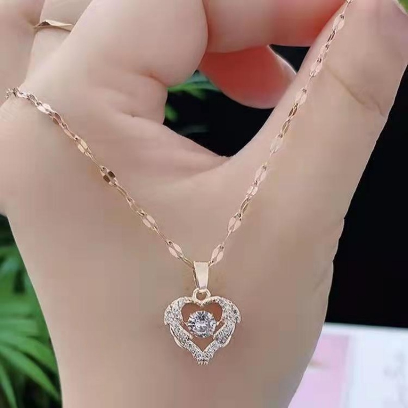 Kalung Liontin Hati Bahan Titanium Steel Warna Emas Untuk Wanita