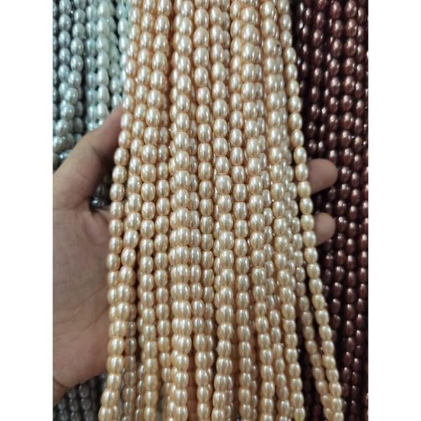 MUTIARA SINTETIS OVAL BERAT BENTUK OVAL UKURAN 6MM KUALITAS BAGUS DAN KILAP PER RENTENG