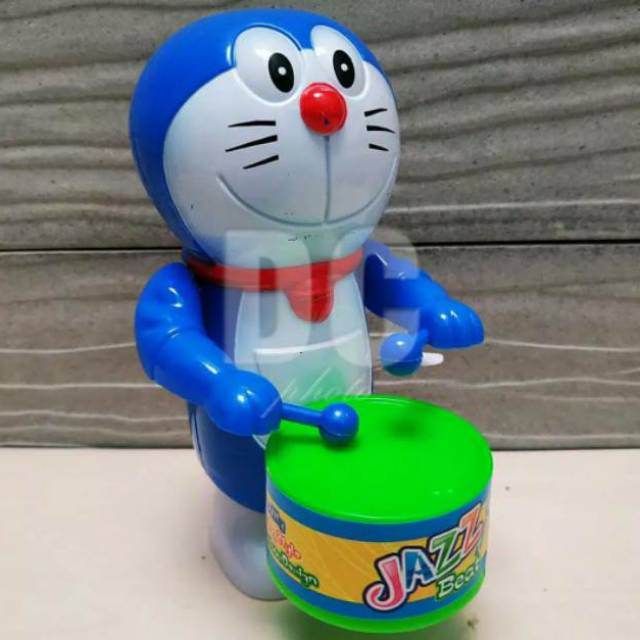 Mainan anak doraemon drumband