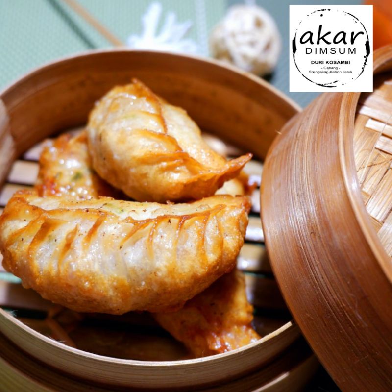 

Gyoza / pangsit Frozen / beku isi 25 pcs by Akar Dimsum