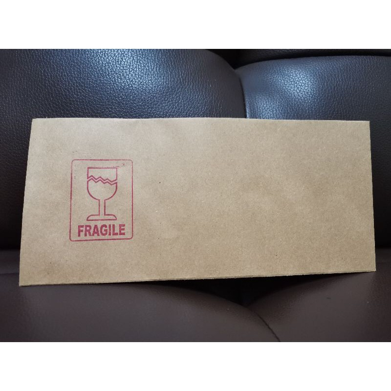 

Amplop FRAGILE map coklat ukuran Cabinet 10.8 X 24 kabinet