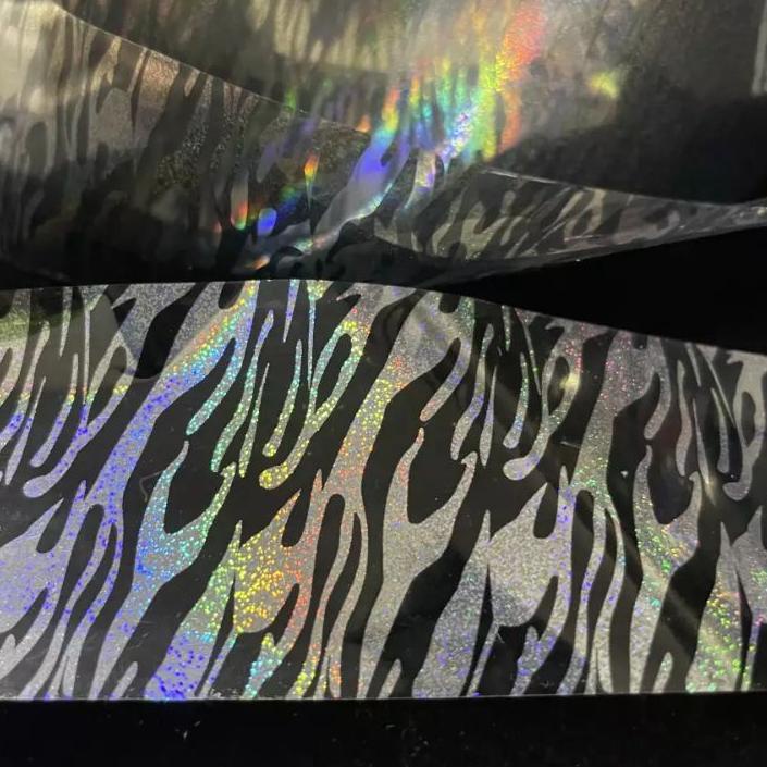 

레 STAMPING FOIL / HOLOGRAPHIC FOIL / HOLOGRAM FOIL MOTIF ZEBRA TRANSPARAN 4 Cm x 5 Meter GROSIR