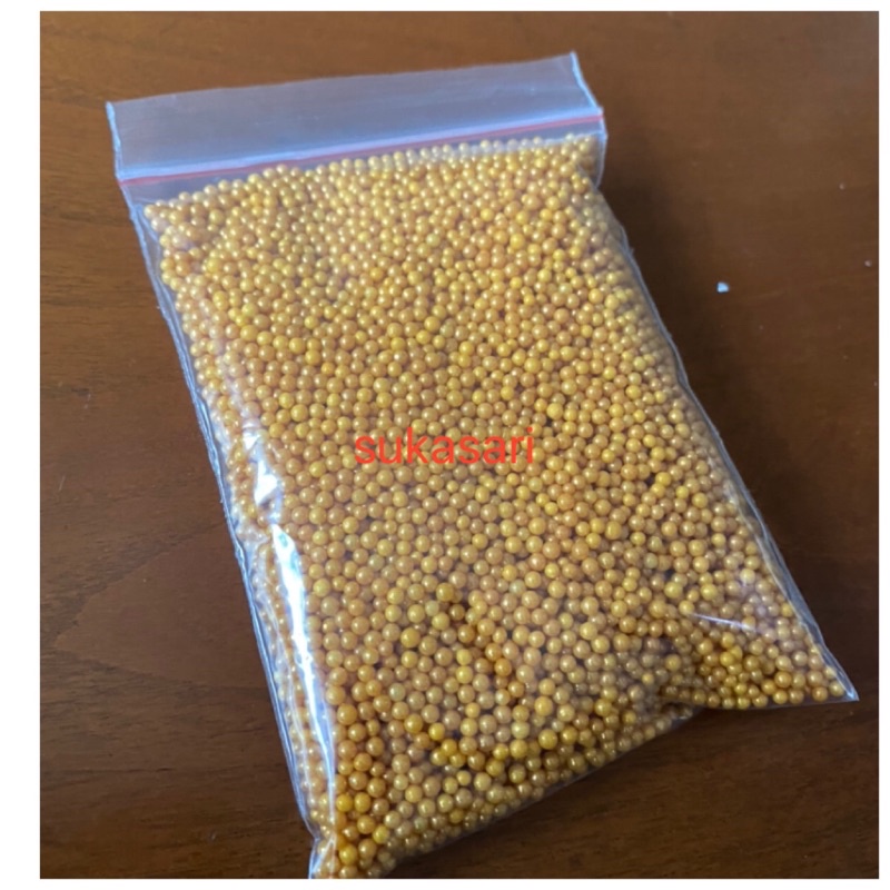 

Sprinkle Pearl mutiara Gold emas 1mm 100gr repack / edible taburan hiasan