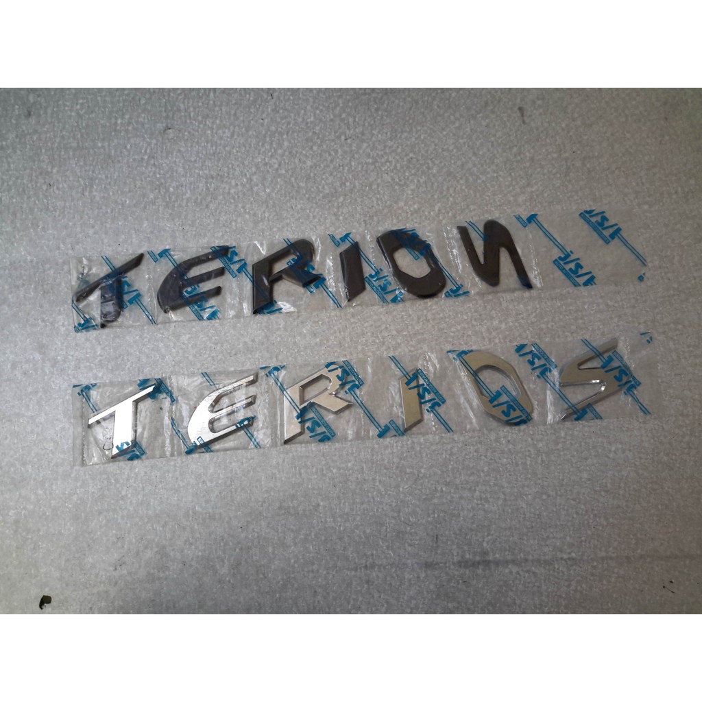 EMBLEM KAP MESIN TERIOS