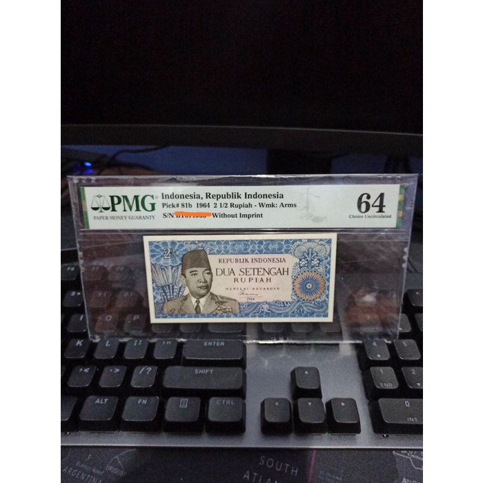Uang Kuno 2.5 Rupiah Soekarno Tahun 1964 Sertifikat PMG 64 UNC