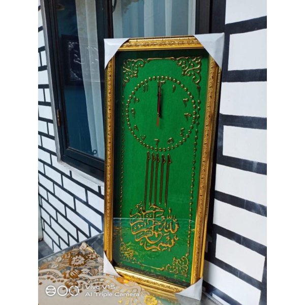 Jam kaligrafi timbul