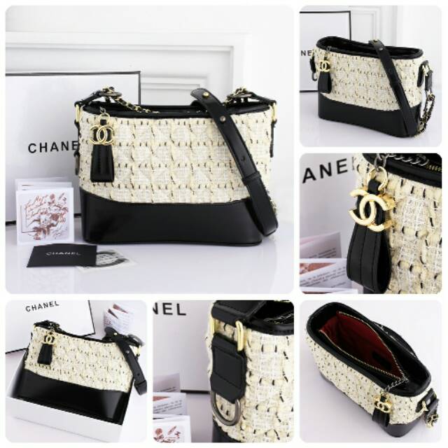 *Chanel Gabrielle Tweed Bag*
Embellished Medium Hobo Bag Material Tweed & Aged Calfskin *Offwhite