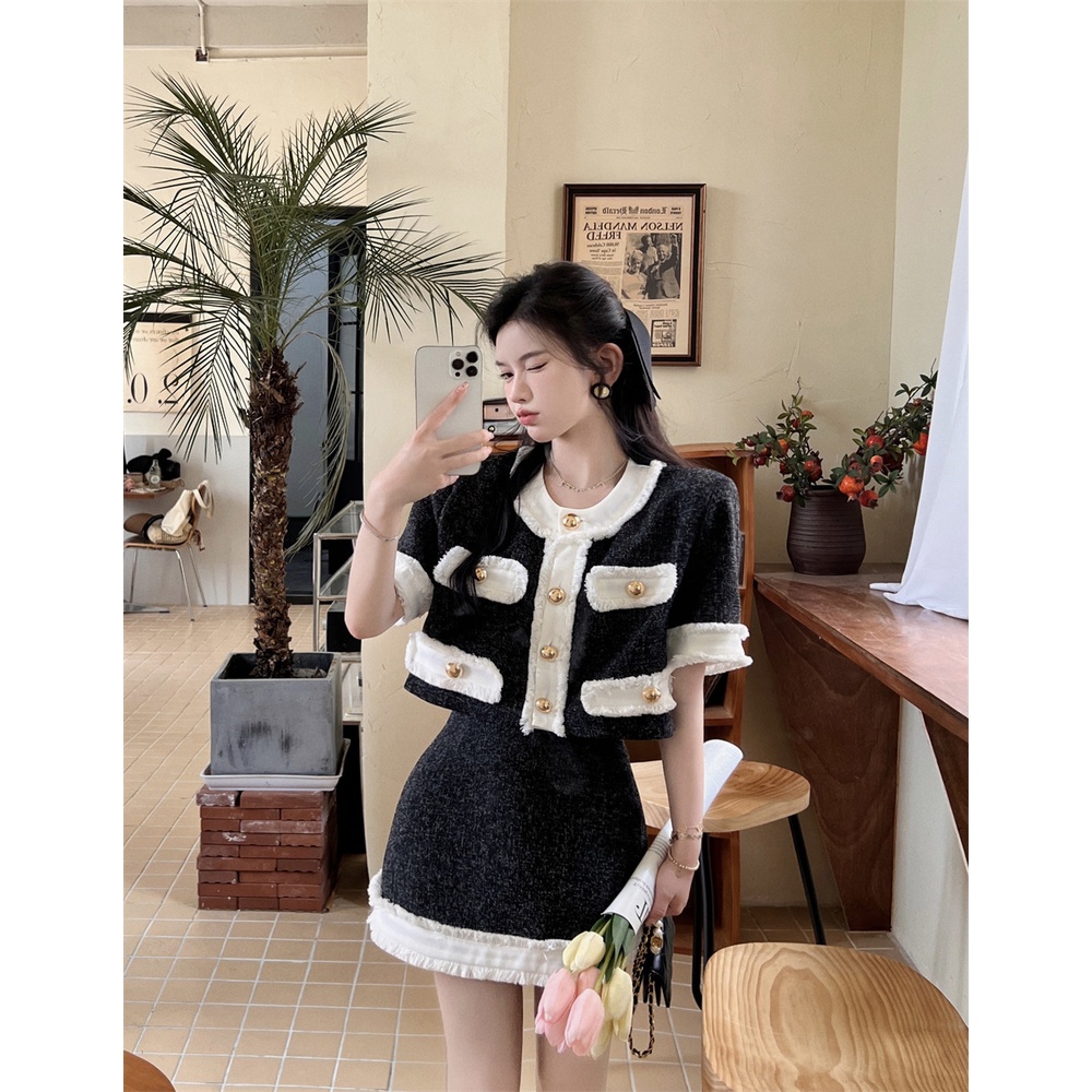 Xiaoxiangfeng high-end temperamen setelan wanita musim panas desain niche tas lengan pendek atas rok