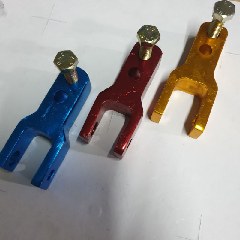 Peninggi shock bawah ketapel matic