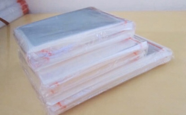 Showme Plastik packing OPP 31x  39   04 lem  / plastik opp / plastik packing / plastik kaca per 100 lembar