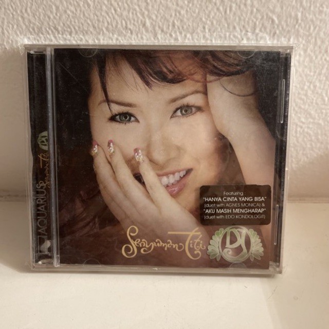 CD Titi DJ - Senyuman