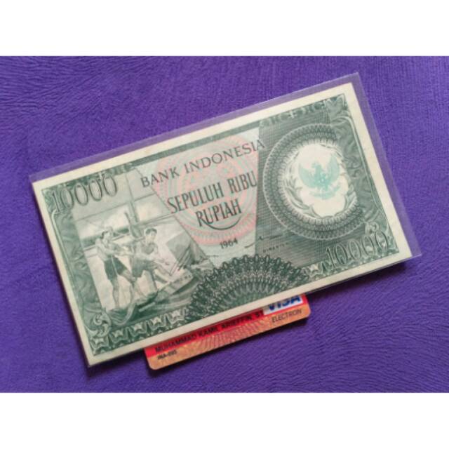 UANG KUNO UANG LAMA 10.000 rupiah seri pekerja hijau 8 watermark