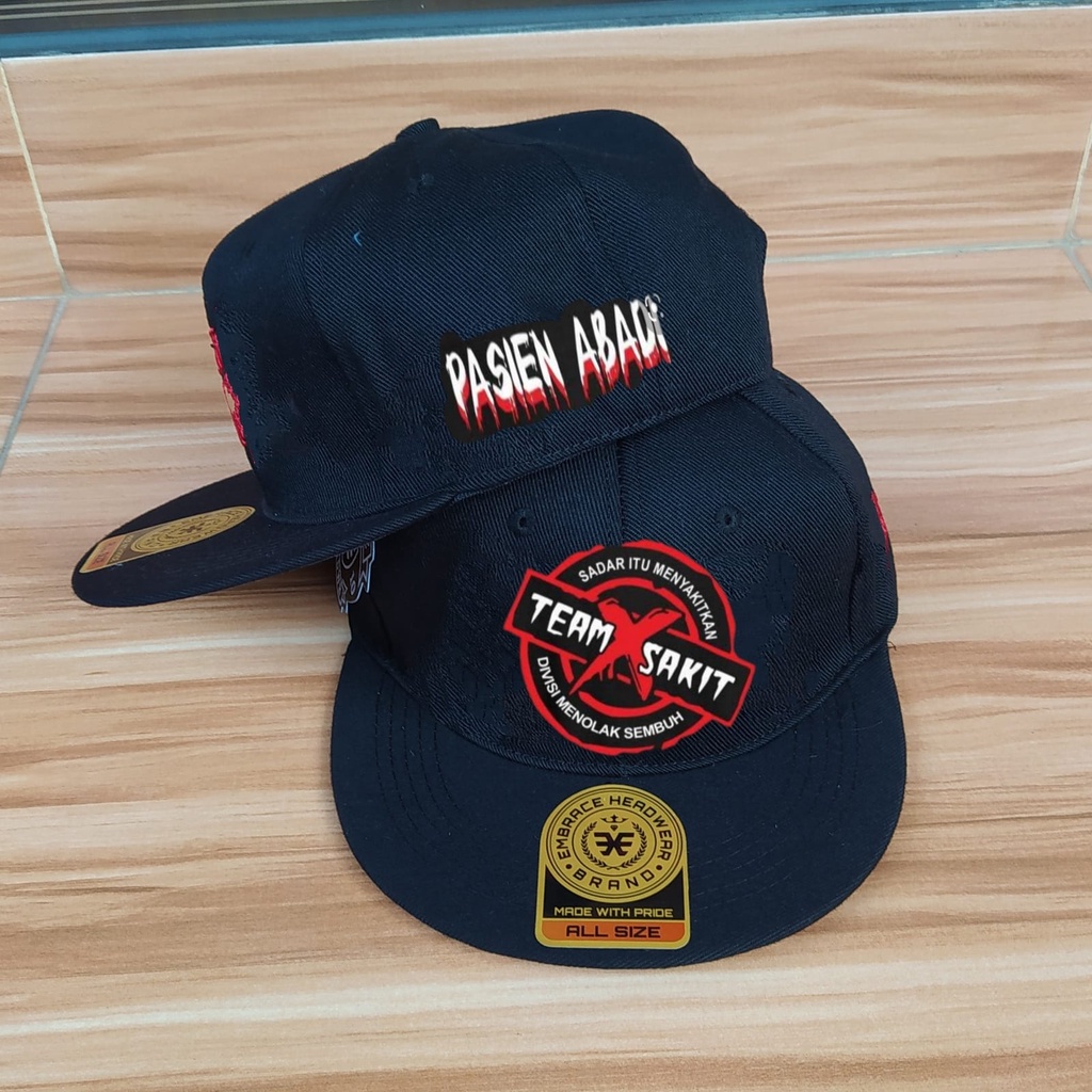 SnapbackTOPI distro TEAM SAKIT JIWA, topi distro, topi metal, topi band metal, Snapback metal, topi Embrace