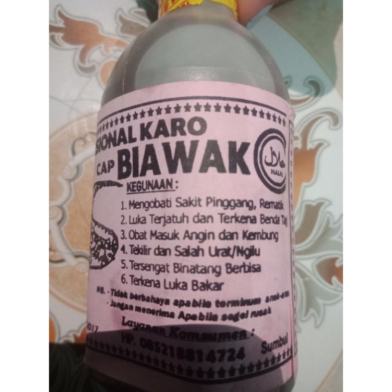 

Minyak Urut Karo Cap Biawak