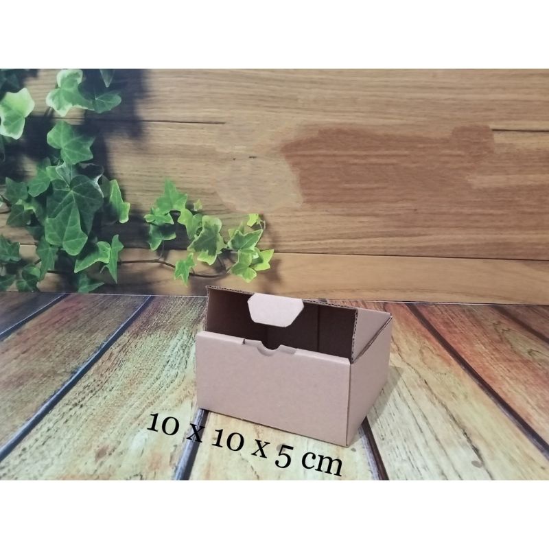 

kardus 10 x 10 x 5cm .. die cut