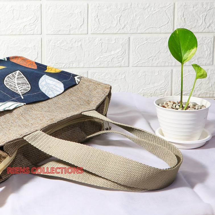 RIENS COLLECTIONS. TAS GONI KOMBINASI KANVAS MOTIF DAUN NANGKA BIRU