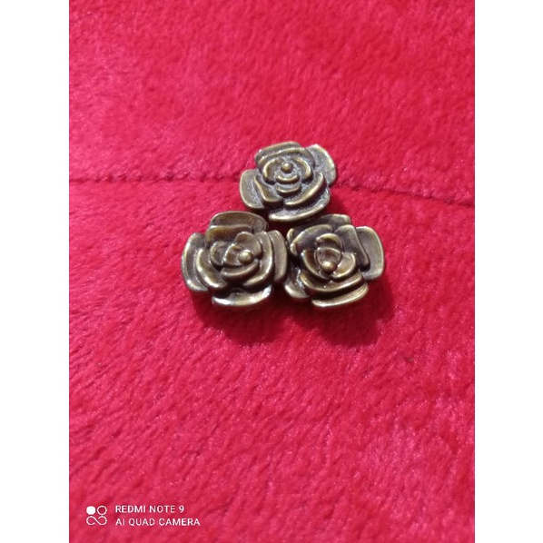 kancing baju bentuk bunga mawar