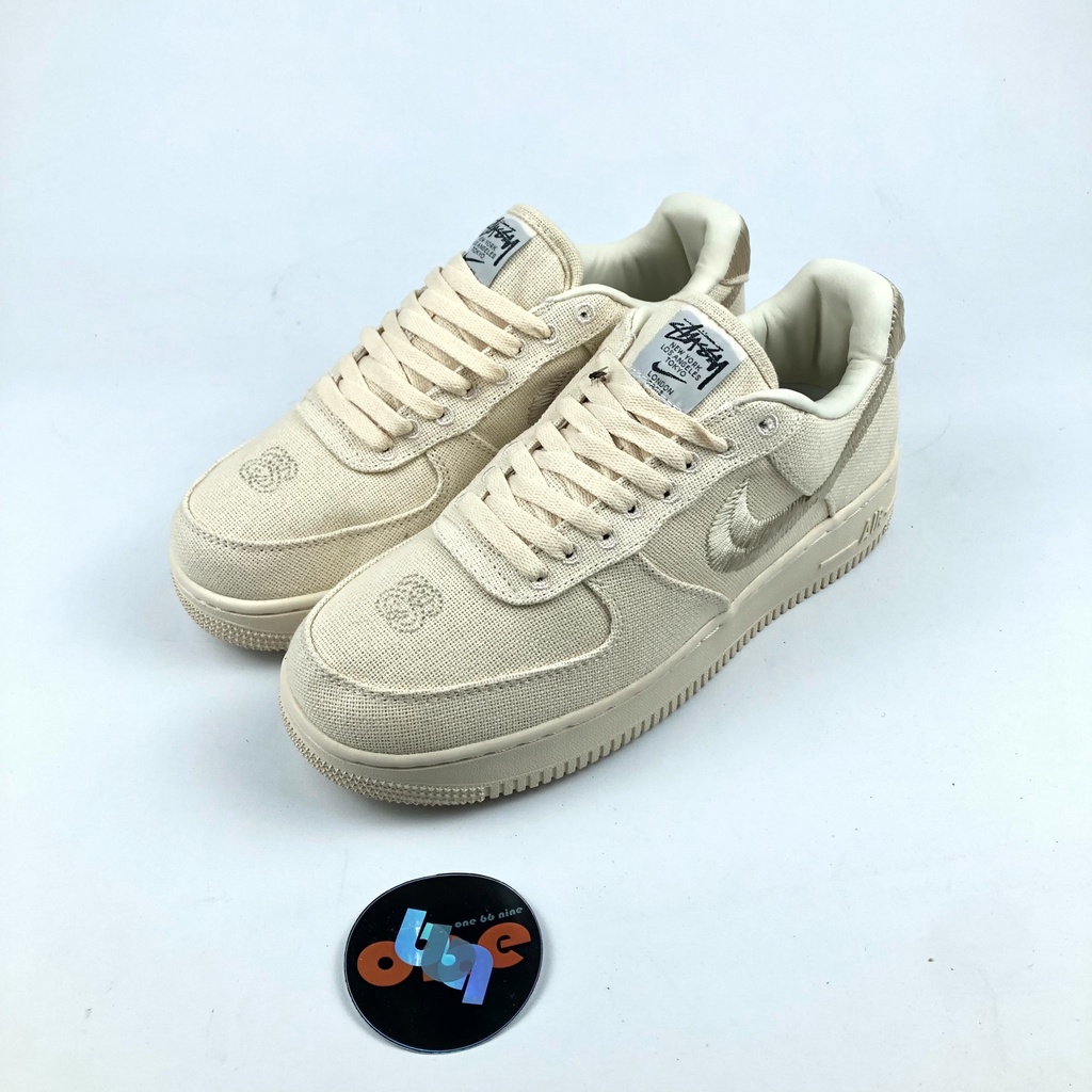 SEPATU NIKE AIR FORCE 1 LOW STUSSY CREM