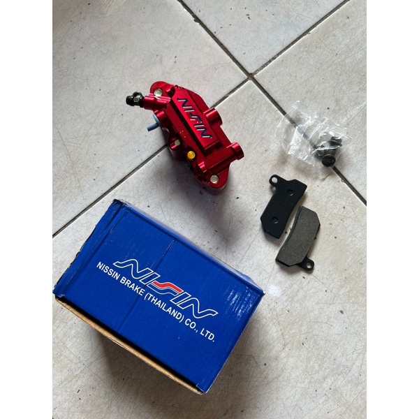 kaliper nissin 4 piston warna red