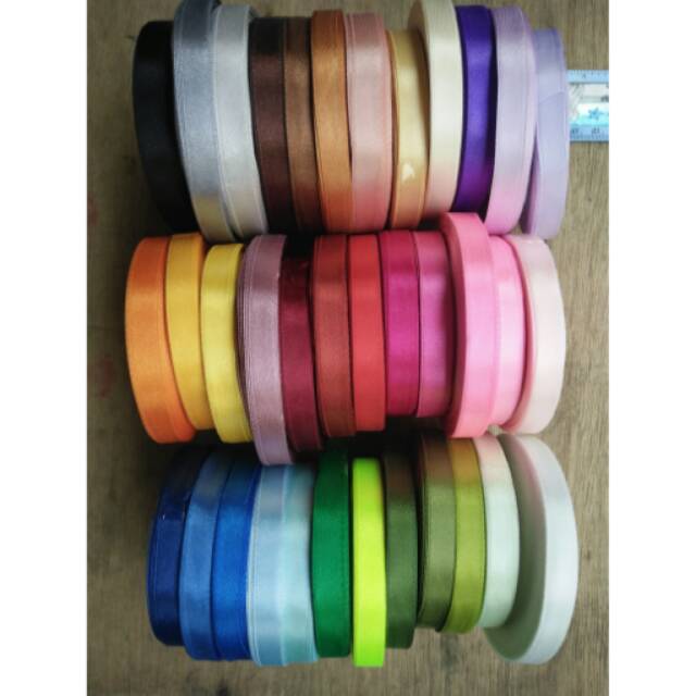 

Pita satin 1 cm baris atas