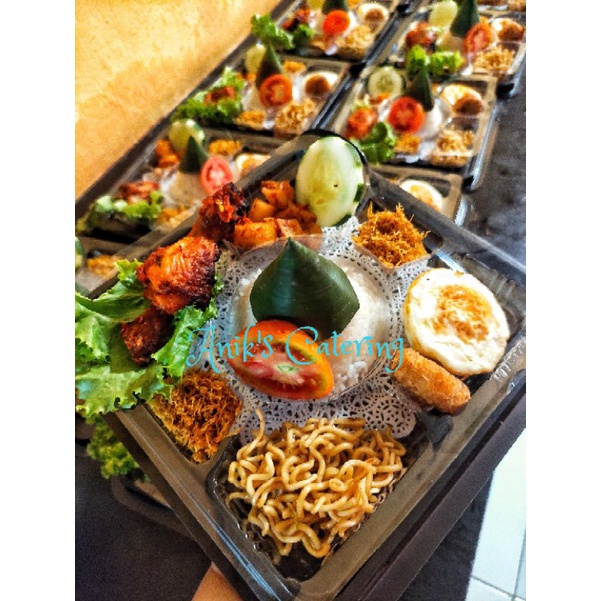 

Tumpeng mini sz L nasi kuning Surabaya